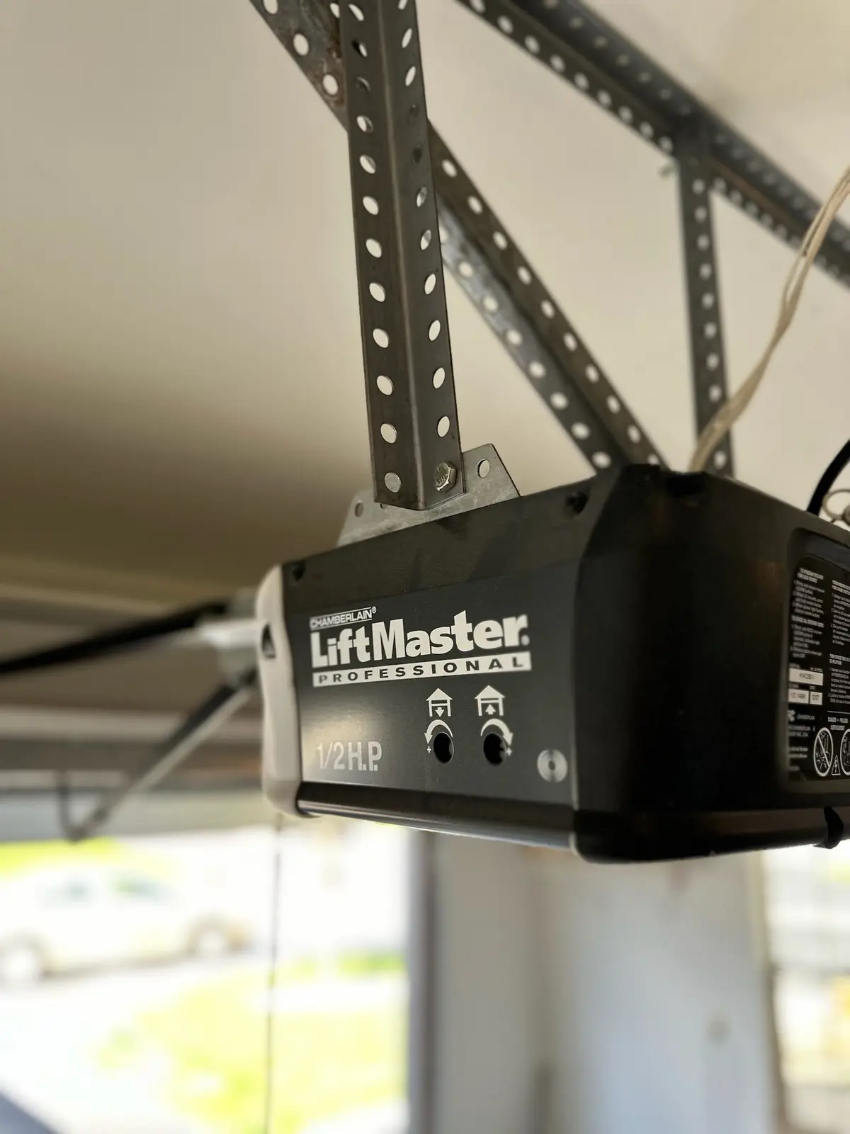 LiftMaster Professional garage door opener mounted on a garage ceiling